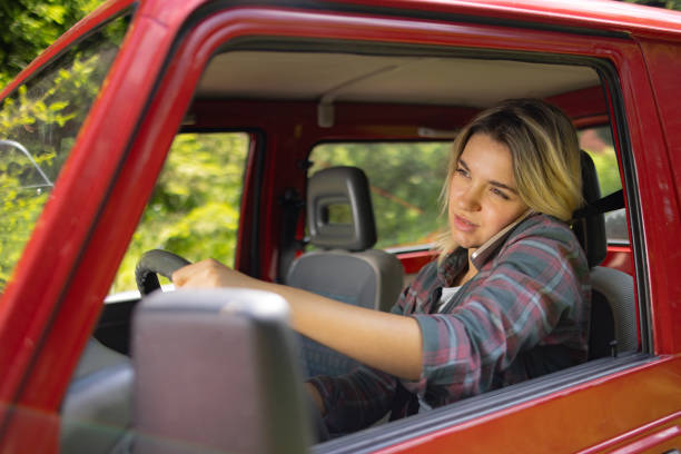 istock It's risky to drive and talk on the phone! 1557728363