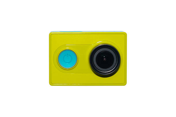 istock Action camera in bright colors isolated on white background. A small Action Camera for video shooting on the go 1557729441