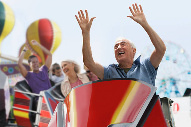 ride roller coaster - senior adult human face male action photos et images de collection