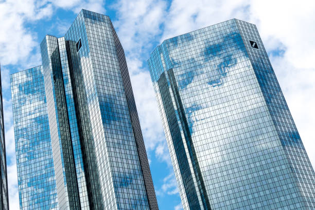 Frankfurt am Main, Germany - June 27, 2020: The Deutsche Bank Twin Towers in the central business district of Frankfurt, also known as Deutsche Bank Headquarters, twin tower skyscraper complex
