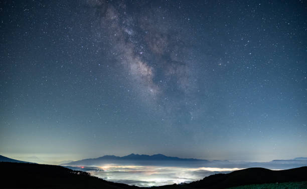 istock Sea of clouds and Milky Way in summer 1557765594