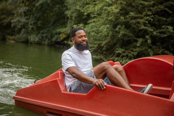 A paddle against a river. A rowboat ride.