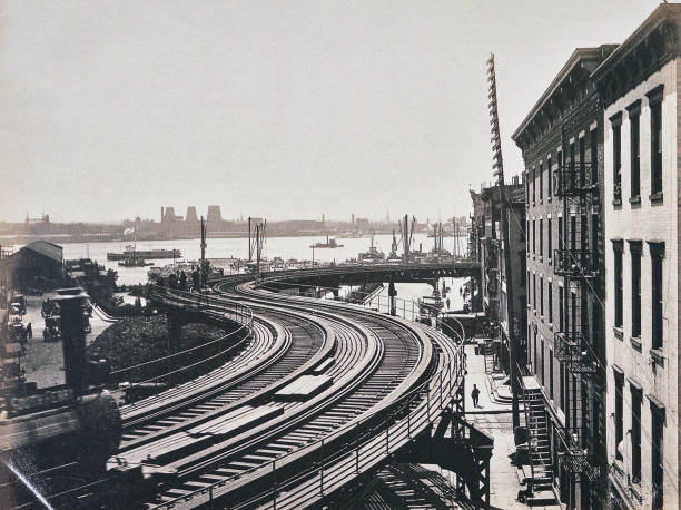 istock Elevated railway nearby Coentis Slip, New York City, 1890 1557791607