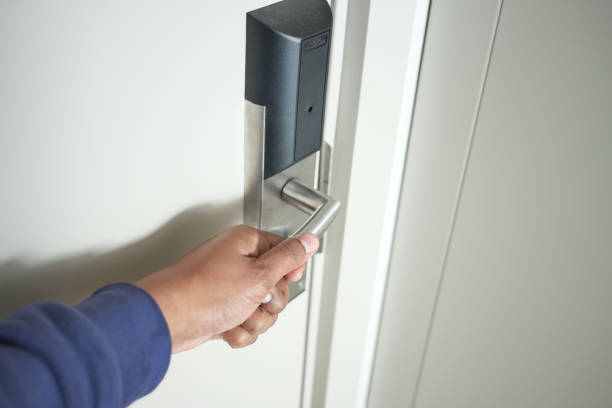 istock Man's Hand Opening door close up 1557803892