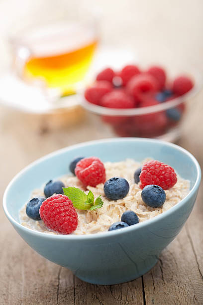 istock porridge with fresh berries 155780772