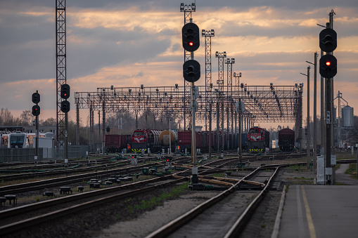 Radviliskis, Lithuania - April 21, 2020: Railway Network In Lithuania. Radviliskis is well known railway capital in Lithuania. Beautiful evening sunset light and cars in background.