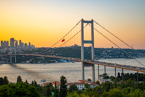 Istanbul, Turkey : July 19, 2023: Istanbul Bosphorus evening, Bosphorus Bridge at sunset time, Istanbul - Turkey