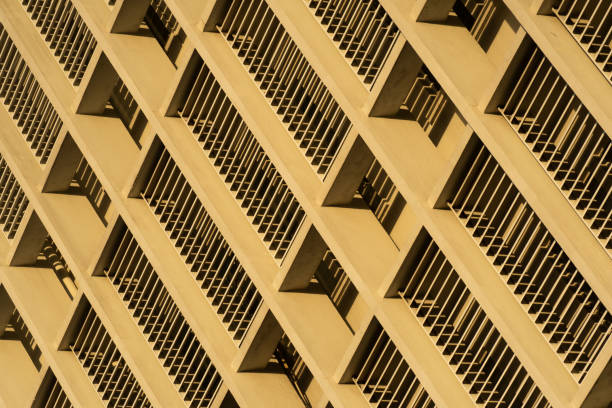 istock building pale yellow facade architectural abstract background 1557863561