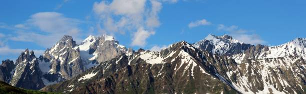 istock Panaromic view of Ushba Mountains 1557872150