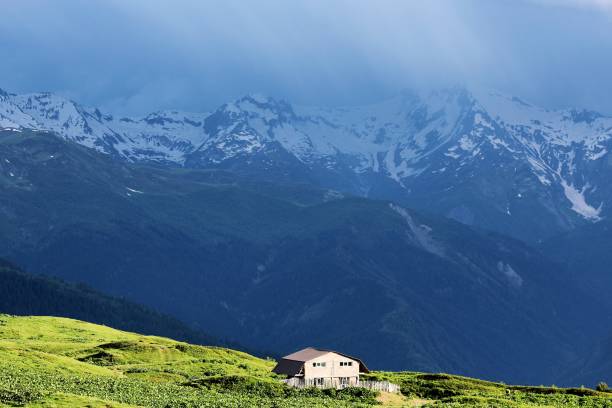 istock A cottage with a Ushba mountain view, Caucasus 1557880078