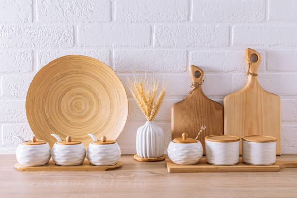 istock various types of kitchen utensils and utensils on a marble countertop against a white brick wall. front view. ecologically clean kitchen 1557901426