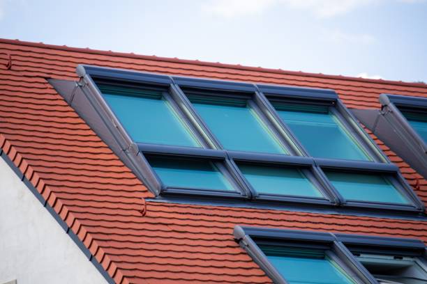 istock Newly tiled roof with large skylight windows 1557907792