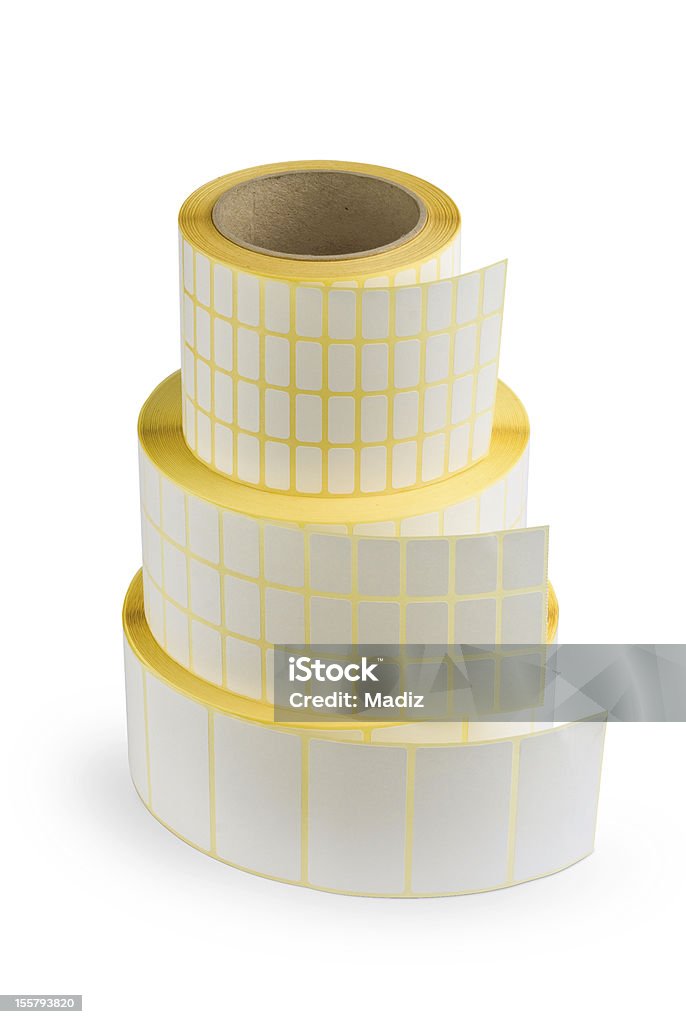 Sticky labels Three sticky labels rolls on white background. Cut Out Stock Photo