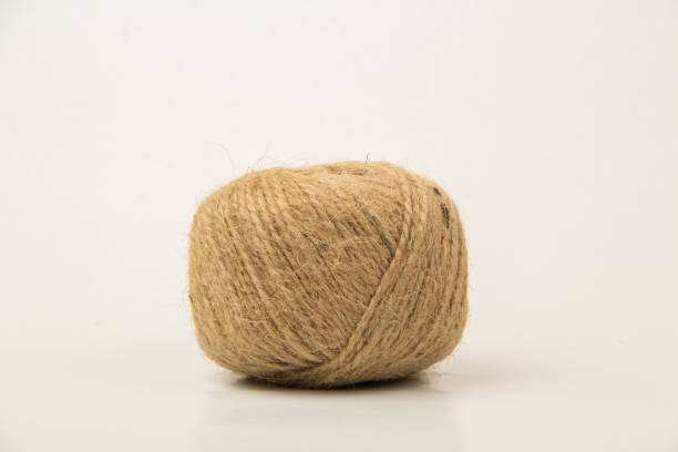 istock jute Twine isolated on white background. Vintage concept. 1557946302