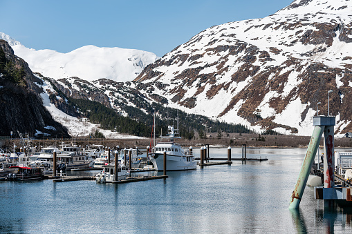Snow covered mountains behind the marina at Whittier, Alaska, USA
