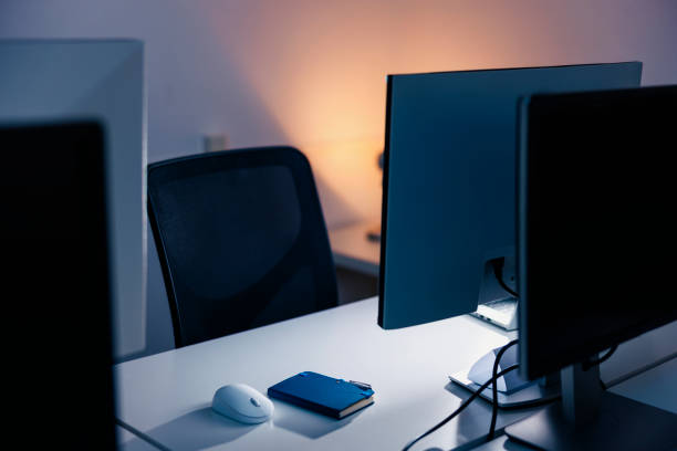 istock Detail of office interior design by night 1557969410