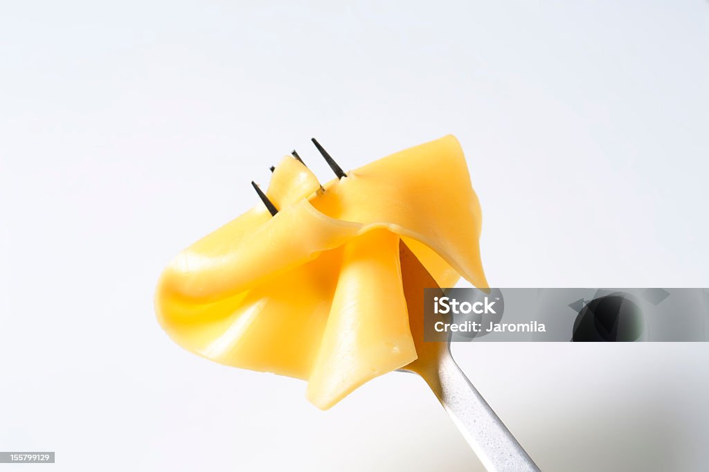Fatia de queijo em um prato - Foto de stock de Queijo royalty-free