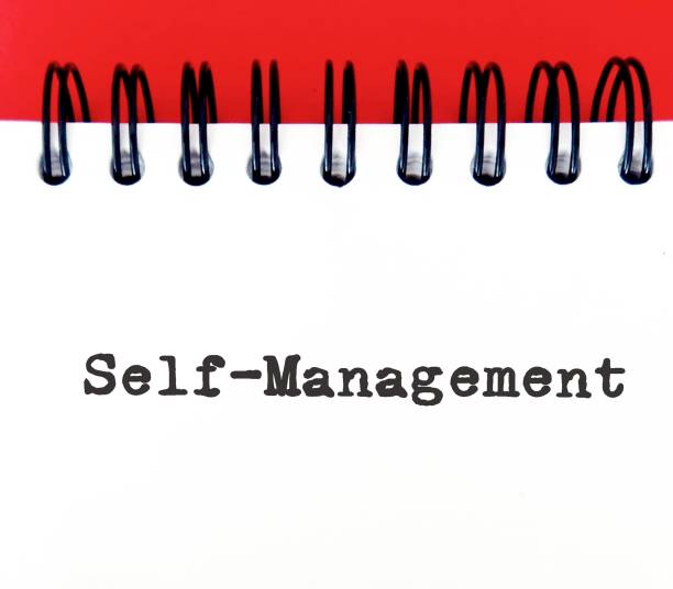istock Notebook with handwritten text SELF MANAGEMENT, ability to regulate thoughts, behaviors and emotions in productive way 1558052935