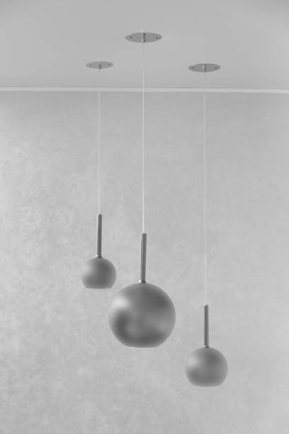 istock three chandeliers on a gray background 1558134498