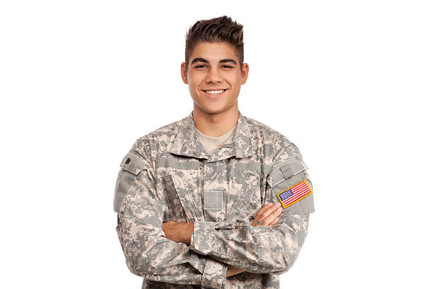 Smiling serviceman with his arms crossed