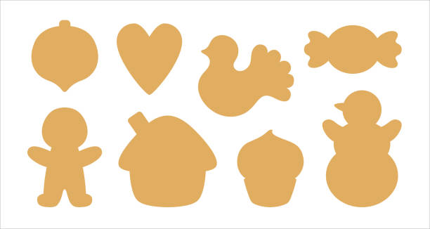 Christmas silhouette symbols icon set for decal, label tag, cookie cutter. Simple silhouettes of Xmas objects - gingerbread house, bird, candy, snowman, heart, cupcake. Sugar cookie cutter shapes or tag label die cutting template. gingerbread man cookie cutter stock illustrations