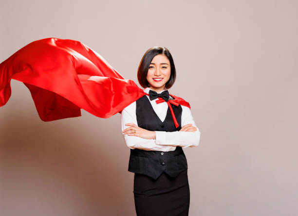 istock Receptionist in fluttering hero cloak 1558183171