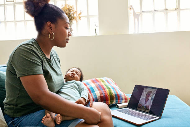 Mother consulting with doctor on video call
