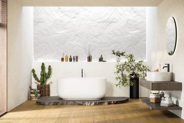 istock Modern bathroom interior with white bathtub and marble vanity. 1558196762