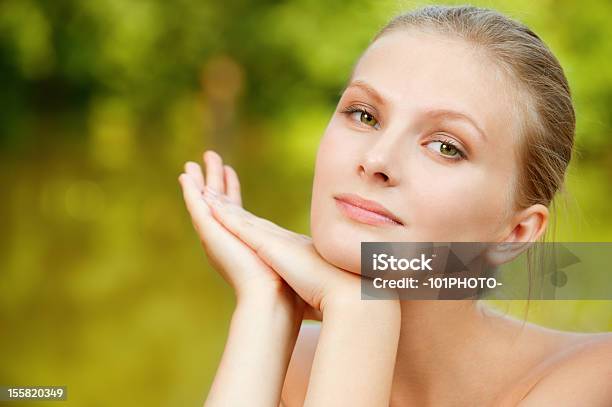 Portrait Of Woman Against Lake Stock Photo - Download Image Now - 20-24 Years, Adult, Adults Only