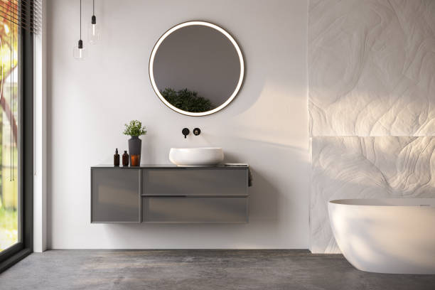 istock Modern bathroom interior with white bathtub and chic vanity, white walls, parquet floor. 1558204881
