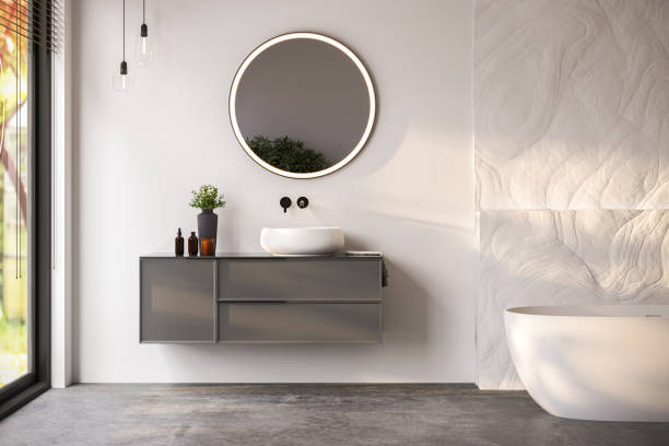 istock Modern bathroom interior with white bathtub and chic vanity, white walls, parquet floor. 1558211319