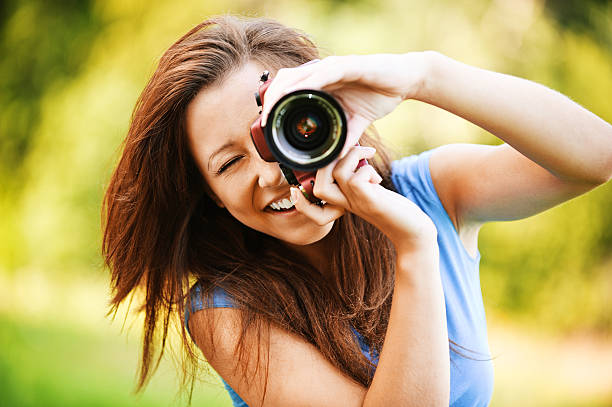 istock young smiling girl making photo 155823399