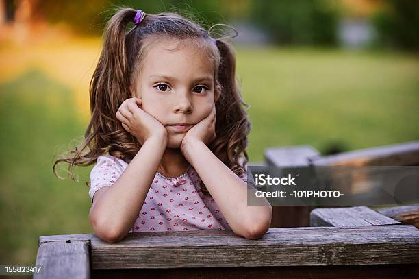 Portrait Of Lovable Pretty Girl Stock Photo - Download Image Now - Child, Serious, Sadness