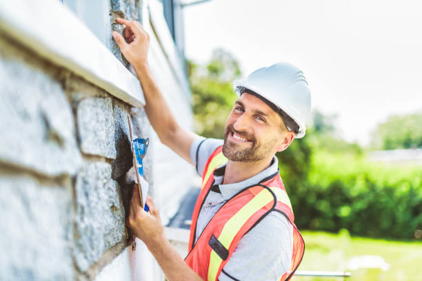 istock Man with a white hard hat holding a clipboard, inspect house 1558241404