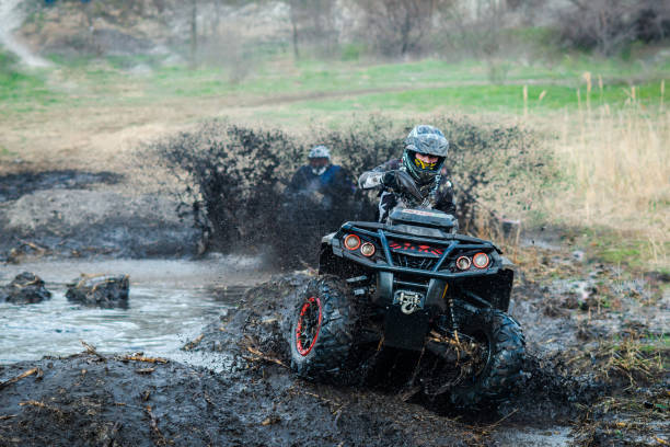 istock ATV, UTV, buggy, 4x4 off-road vehicle in muddy water. Extreme, adrenalin 1558260027