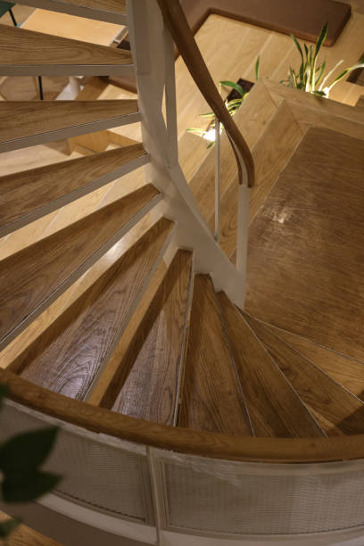 istock Modern spiral wood staircase 1558285814