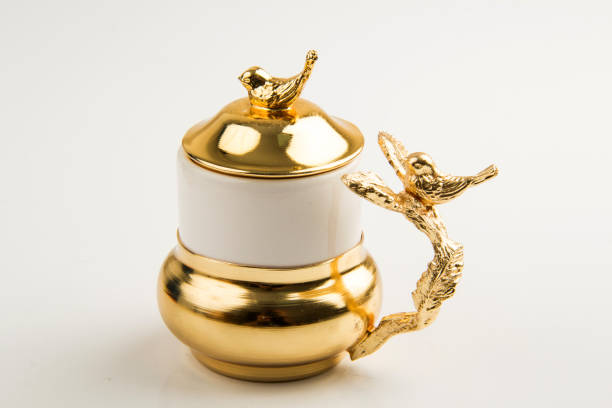 istock Golden and silver colored Traditional Turkish coffee  cups 1558286917