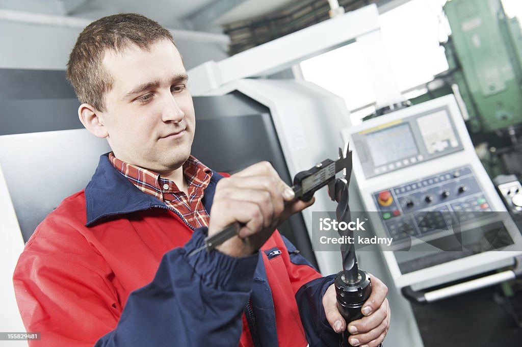 Worker Using Calipers Machinist Worker Using Hand Calipers Stock Photo - Download Image Now ...