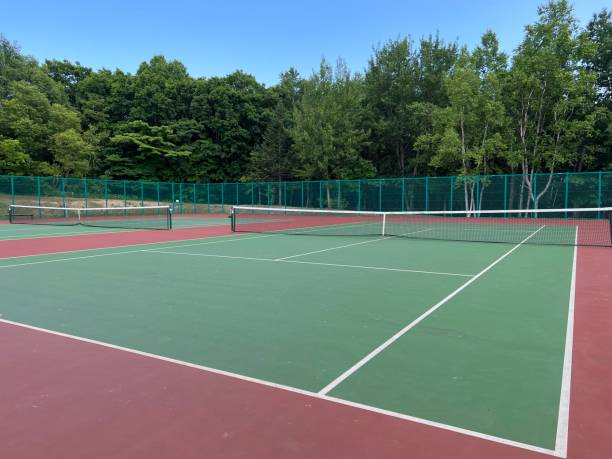 istock Park Tennis Courts 1558302171