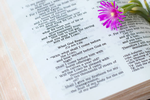 istock What God requires, biblical verses in open holy bible book 1558321189