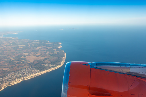 Jet engine against coast of Majorca, Spain