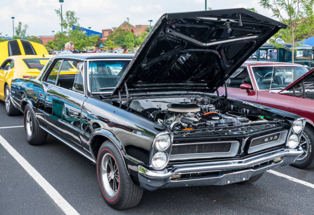 a pontiac gto coupe on display at a car show in homestead, pennsylvania, usa - pontiac gto imagens e fotografias de stock