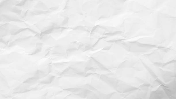istock White Paper Texture background. Crumpled white paper abstract shape background with space paper recycle for text 1558371410