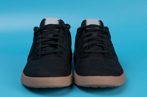 istock Front view of black casual shoes 1558391584