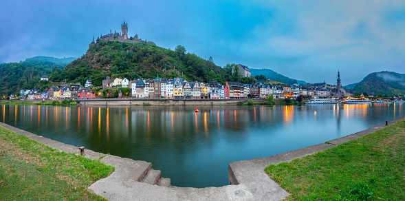 Scenic panoramic view of the old fabulous German city of Cochem at dawn. Germany.