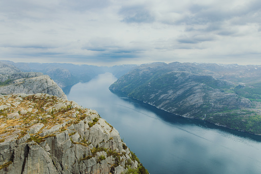 Panoramic view of scenic fjord with crystal blue sea and Mountain View from above during summer time in South Norway, Scandinavia