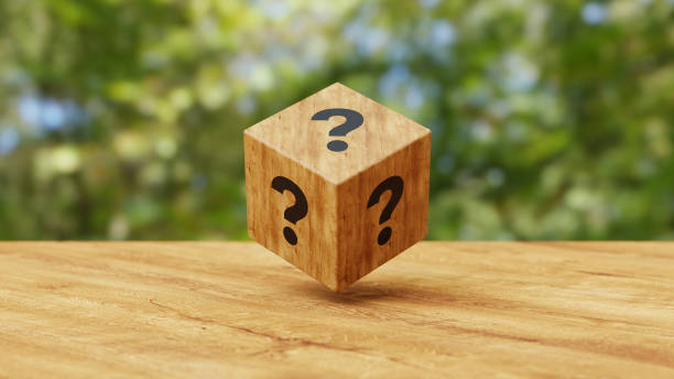 istock Wooden cube with Questions Mark on wooden table background. FAQ, frequency asked questions, Answer, Q and A, Information, Communication and interrogation Concept, 3d illustration 1558450576