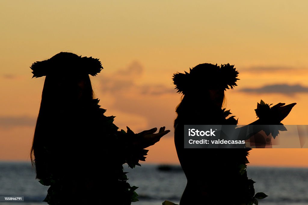 Hawaiian Hula Hawaiian girls dancing the hula at sunset, Maui Luau Stock Photo