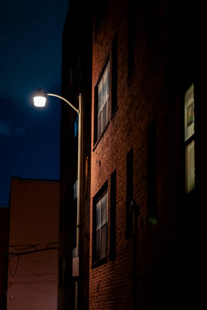 istock Night street view and buildings 1558482173