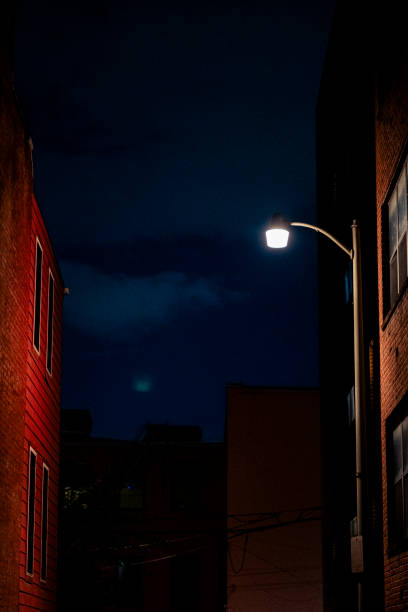 istock Night street view and buildings 1558482174